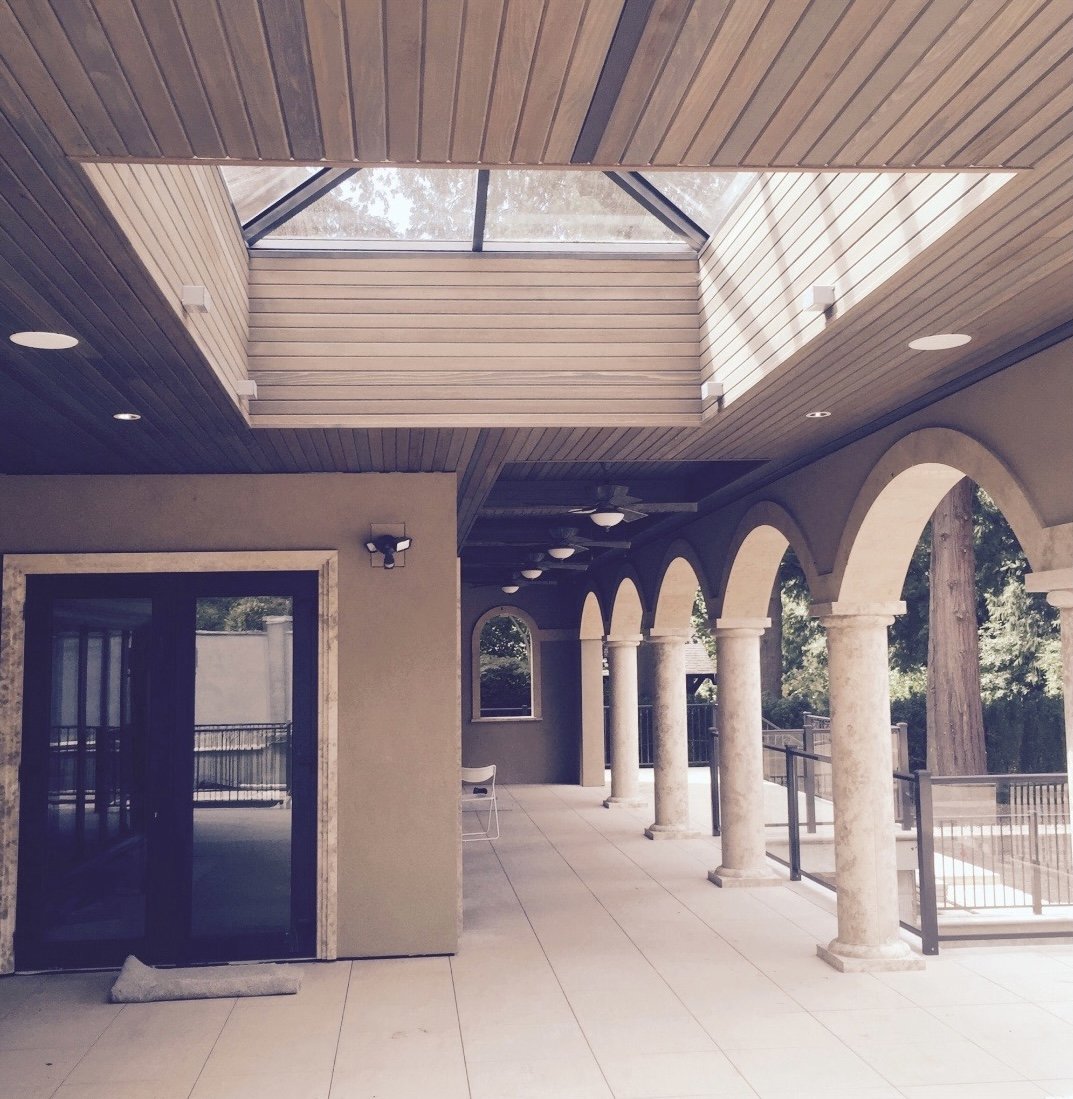 Covered patio with soffit and skylight